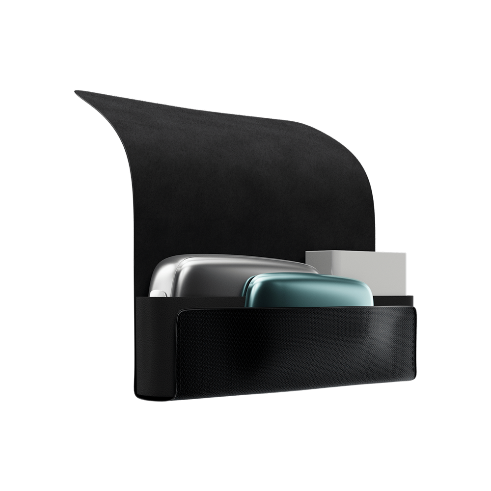 Ploom X Advanced Carry case black lateral open, shown with a Ploom device, a pack of sticks, and Aqua Green front panel in the side pocket.
