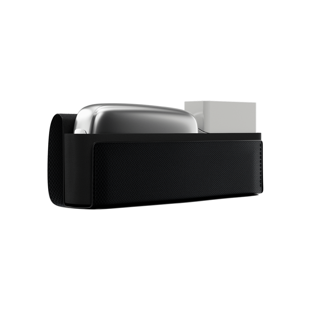 Ploom X Advanced Carry case black open, shown with a Ploom device and a pack of sticks inside.