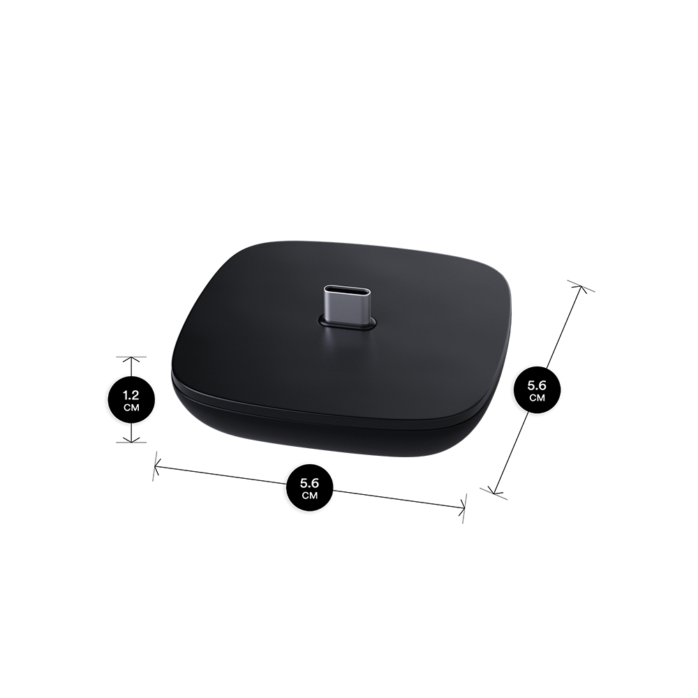 Ploom docking station close-up showing product dimensions: 5.6 cm x 5.6 xm x 1.2 cm.
