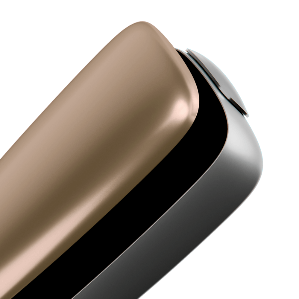 Ploom X Advanced front panel gold close up, shown on device
