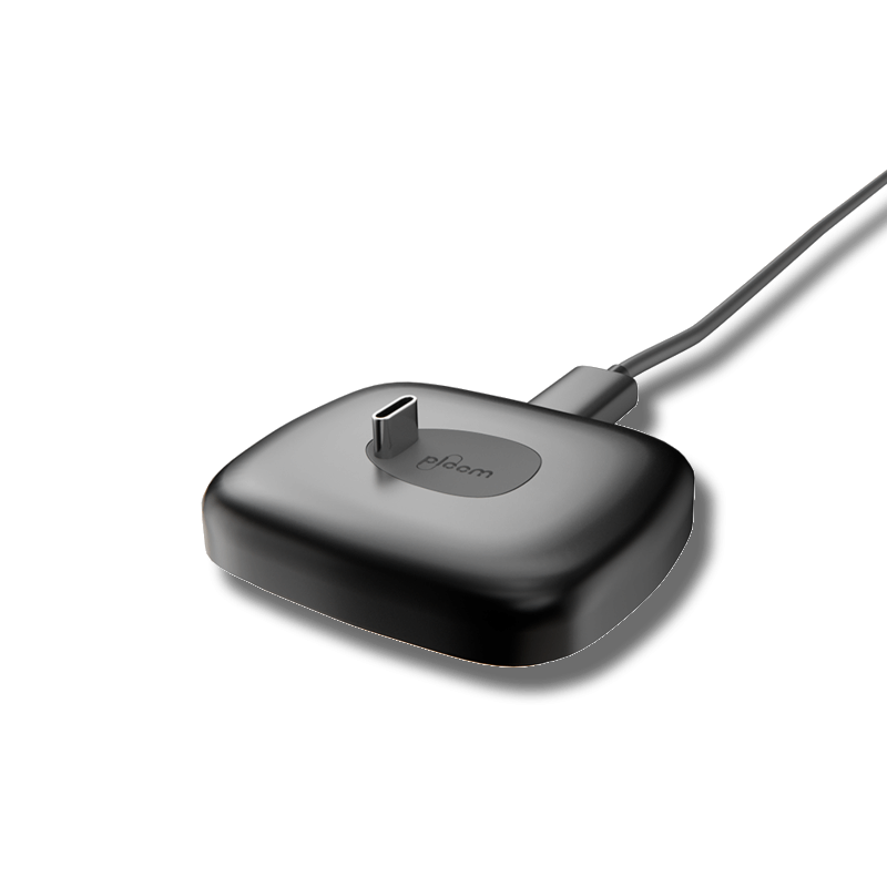 Ploom X Advanced qara rəngli dok stansiyasının yuxarıdan çəkilmiş renderi